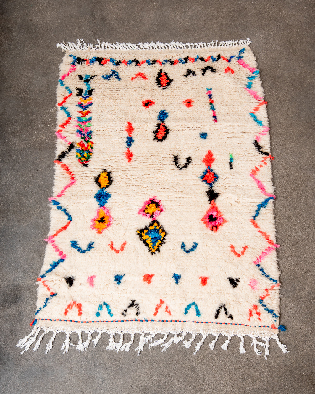 Modern designer handcrafted Berber rug from morocco Azilal with beautiful colors and patterns.